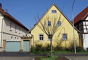 This is a picture of the Bavarian Baudenkmal (cultural heritage monument) with the ID D-6-78-150-137 (Wikidata) Herlindenstraße 27, Herlheim, Gemeinde Kolizheim, Unterfranken, Deutschland