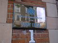 Plaque outside the High commission depicting the Coat of arms of Saint Lucia