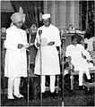 Prime Minister Nehru inaugurating the Madhya Bharat Union by swearing-in the Maharajah of Gwalior as Rajpramukh. Seated on right is the Maharajah of Indore on May 28, 1948