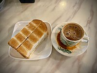 Kaya toast, Yinzo Kopi, Ipoh, Malaysia with cup of coffee.jpg