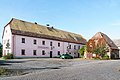 Inn with equipment, barn and stone path