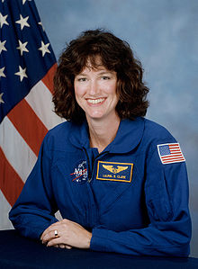 Laurel Clark, NASA photo portrait in blue suit.jpg