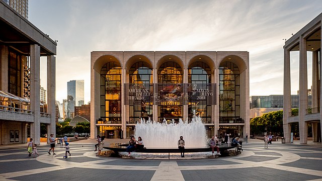The David H. Koch Theater (left), The Metropolitan Opera House (center), and David Geffen Hall (right) and the Revson Fountain in front
