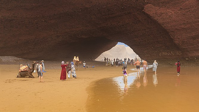 View of the famous stone arch on Legzira beach near Sidi Ifni, Morocco