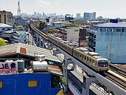 Manila Line 2 пойызы Araneta Center - Cubao station.jpg бағытында жүр