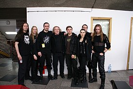 Слева направо: Chris, Darkside, Daamr, Роман Костржевски (как гость), Spectre, Nera, Flauros (позади Nera) и Bacchus. «Metalmania». 2007 год.