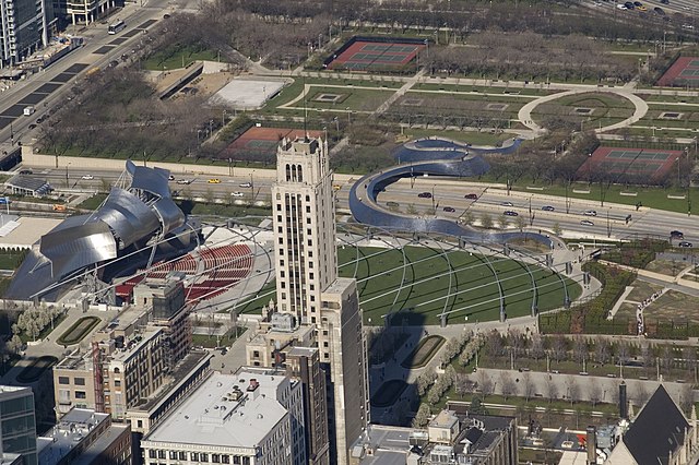 Pritzker Pavilion and BP Bridge in Millennium Park, with Daley Bicentennial Plaza behind, seen from Willis Tower in 2007