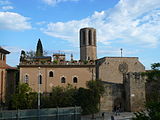 ]]. Baixada del Monestir, 1-15 (Barcelona). This is a photo of a monument indexed in the Catalan heritage register of Béns Culturals d'Interès Nacional and the Spanish heritage register of Bienes de Interés Cultural under the reference RI-51-0000431. Object location 41° 23′ 44.02″ N, 2° 06′ 45″ E  View all coordinates using: OpenStreetMap