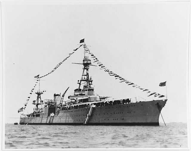 The then-flagship of the Asiatic Fleet, the heavy cruiser Houston, at Qingdao, China, on 4 July 1933. She flies the four-star pennant of the fleet's c