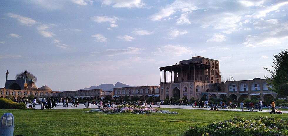 View on the Naghsh-e Jahan Square in Isfahan on a sunny day. The Lutfollah Mosque is on the left, the Dawlatkhane in the middle.