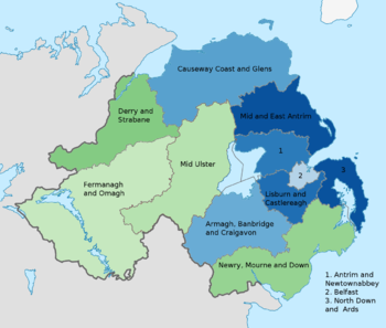 Map of new districts of Northern Ireland colour coded to show the predominant national identity at the time of the 2011 census. Stronger green indicates a higher proportion of people describing themselves as Irish. Stronger blue indicates a higher proportion of people describing themselves as British. National Identity Northern Ireland New Districts 2011 Census.png