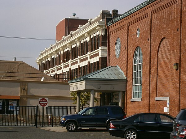 View toward Palisade Ave at Ferry Street in Jersey City Heights showing a former trolley house (right, now offices), station house (left, now a superm