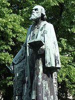 Pierre Cuypersen estatua (August Falise eskultorea), Munsterplein, Roermond (Herbehereak)