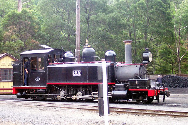 NA locomotive No. 12, in the Black with Red livery used in the early preservation era, at Belgrave on the Puffing Billy Railway.