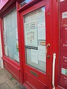 Signs on the door of the Post Office relating to the 2020 Coronavirus pandemic, High Street, Wetherby (28th March 2020).jpg