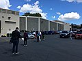 People practicing social distancing by standing 6 feet (1.8 m) apart at a Trader Joe's in Oakland.