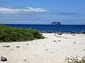 The beach at North Seymour Island in the Galapagos North, Daphne Island is in the distance.