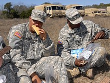 U.S. Army soldiers eating FSRs U.S. Army soldiers consuming First Strike Ration.jpg