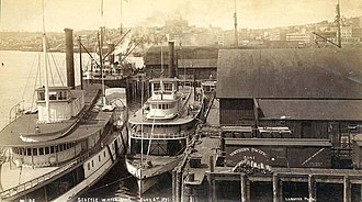 Steamboats at the Union Pacific Dock in Seattle, Washington, June 6, 1891. Multnomah appears to be the vessel closest to the dock. The larger vessel appears to be T.J. Potter. Union Pacific dock, Seattle WA June 6 1891.JPG