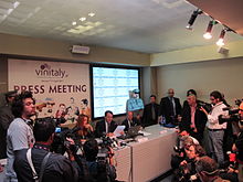 One of the many "press meetings" held by producers, officials and organizations that happen throughout the VinItaly exposition when new partnerships are announced or wine industry awards are given. Vinitaly 2011 press meeting.jpg