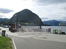 Volda ferjekai. E39 går sidan 2014 i tunnel gjenom Rotsethornet i bakgrunnen.
Foto:
Jan-Tore Egge (2014)