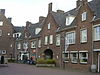 Winkel met bovenwoning