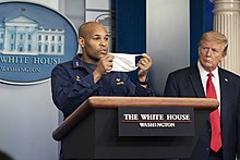 U.S. Surgeon General Jerome Adams urged people to wear face masks and acknowledged that it is difficult to correct earlier messaging that masks do not work for the general public. White House Coronavirus Update Briefing (49810101702).jpg