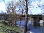 Trinity (sovjetisk) bro och floden Pskov