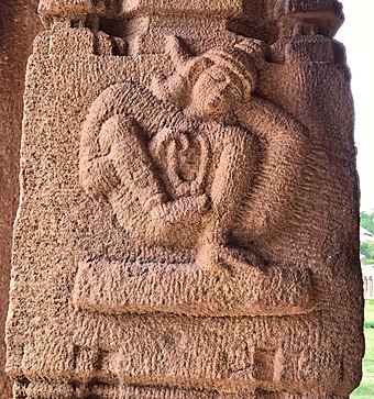 Relief statue in Achyutaraya temple, Hampi, Karnataka showing an unidentified[d] hand-balancing asana,[30] 16th century