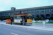 Ex-Market Street Railway car 578 laying over at Pier 39 on September 25, 1987 1987 SF Historic Trolley Festival - car 578 at Pier 39 during Embarcadero demonstration service.jpg