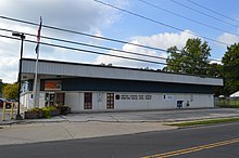 The village post office, bearing the unusual ZIP code 44444.