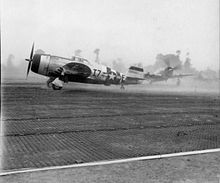 P-47 Thunderbolts of the 48th Fighter Group line up for take off at Deux Jumeaux Airfield