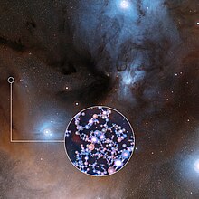 A photographic montage of methyl isocyanate around young Sun-like stars, as detected by the ALMA interferometer (northern Chile). ALMA detects methyl isocyanate around young Sun-like stars.jpg