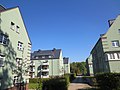 Five residential buildings (No. 1/3, No. 7/9, No. 13/15, No. 5, No. 11) in a residential complex