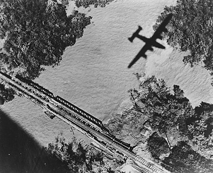 7th BG B-24s attacking the Moulmein-Ye rail line, Burma, 1945.