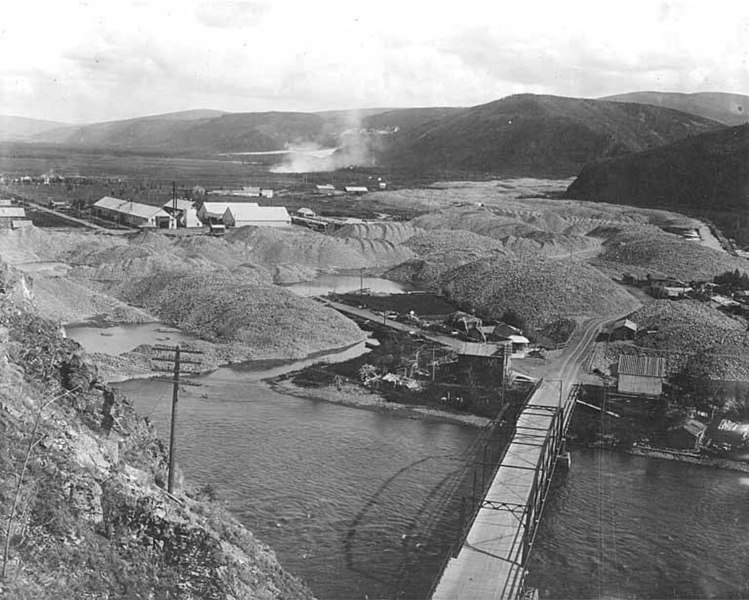 File:Bird's-eye view of the Ogilvie Bridge over the Klondike River showing piles of dredged soil, Yukon Territory, between 1908 and (AL+CA 2257).jpg