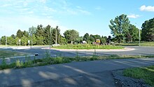 The roundabout at the intersection of Brookfield Road, Flannery Drive, and exit ramps to and from Airport Parkway Brookfield Roundabout.jpg