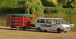 Canoe livery in France, Dordogne. Canoe carrier Dordogne.jpg