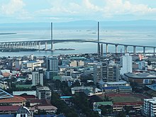 The Cebu-Cordova Link Expressway (CCLEX), the longest sea-crossing bridge in the Philippines as of 2022, connects Cebu City to the municipality of Cordova in Mactan Island. Cebu Downtown CCLEX top view (Cebu City; 09-07-2022).jpg