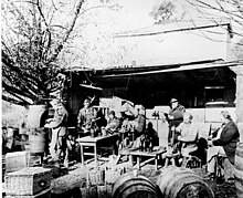 Sparkling wine being bottled during the early 1870s at Buena Vista, as photographed by Eadweard Muybridge Champagne Corking.jpg