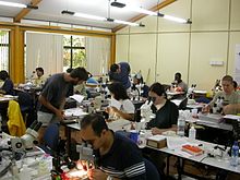 A photograph of one of the classrooms at La Selva being used for an Ant Course taught by Dr. Brian Fisher. Dr. Fisher is a renowned entomologist with a passion for ants. He specializes in the large-scale discovery, description and naming of ants. (https://web.archive.org/web/20101114085729/http://www.calacademy.org/science/heroes/bfisher/) Classroom in use at La Selva Biological Station.jpg