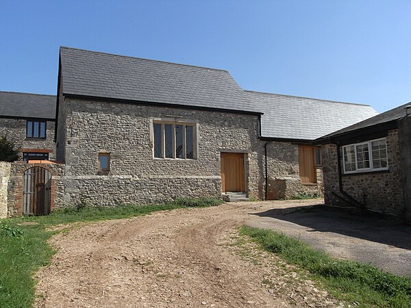 Surviving ancient building formerly part of Colcombe Castle, situated today in the yard of Colcombe Abbey Farm, facing main farmhouse