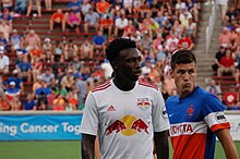Derrick Etienne Jr. won the 2018 Supporters' Shield with the New York Red Bulls. He has earned 39 caps with the Haiti National Team. Derrick Etienne, Eric Stevenson (28411015376).jpg