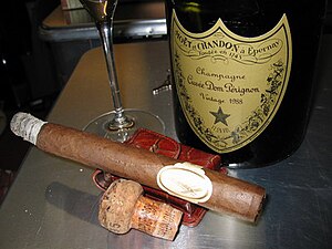 A Cuban-made Davidoff Dom Perignon with its namesake, Dom Perignon champagne Dom Perignons.JPG