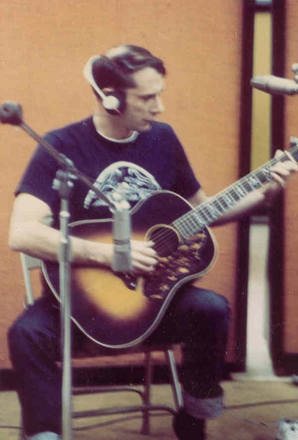 Fahey in studio with Recording King guitar, c. 1970