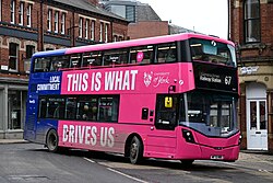 First York's 'University of York'-branded 35927, a 2022 Wright StreetDeck, swings onto Nessgate while working route 67 to Lawrence Street.