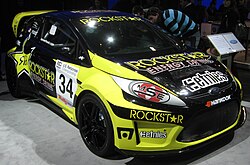 Tanner Foust's Rockstar-Etnies rallycross Ford Fiesta (AWD Division) Ford Fiesta rally car -- 2011 DC.jpg