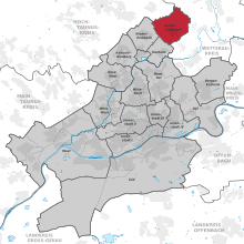 Kartta, jossa kaupunginosa (punainen) sijaitsee muualla kaupungissa (harmaa)