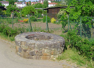 Restored Roman fountain remnant;  it lies in the area of ​​the lost castle