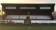 Grandstand overlooking the 1st XV pitch. January 2017 Grand stand at Greensfield.jpg